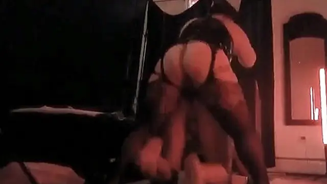 Domina pegging in a locked cage with intense fucking