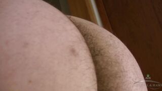 Marie strips and tries on different outfits in the laundry room, while showing off her hairy ass and fluffy pussy.